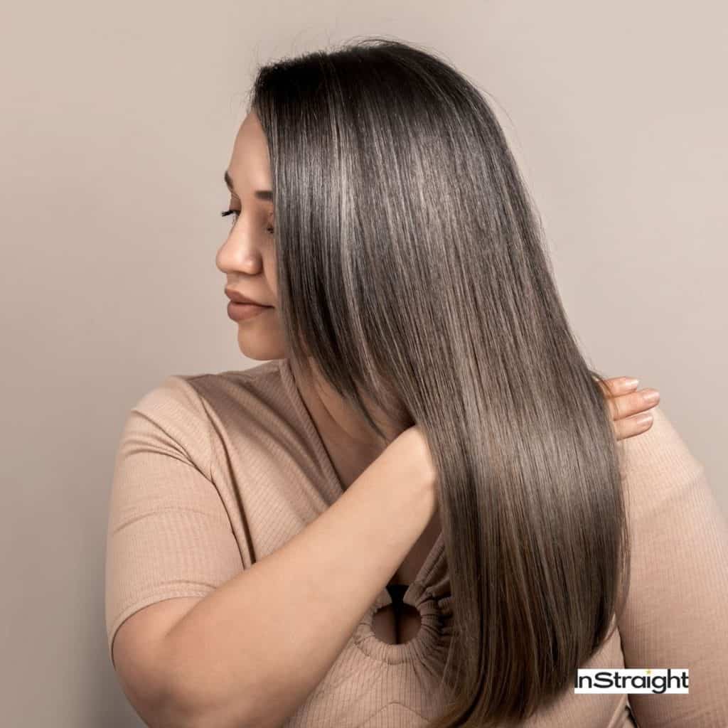 pretty girl giving tips for straightening thick hair